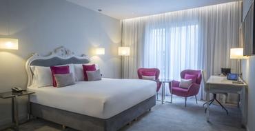 The Morgan Hotel |  | Advance Saver - Up to 15% Off | Comfortable bedroom with pink pillows