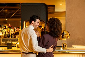 The Morgan Hotel | Couple holding eachother at bar